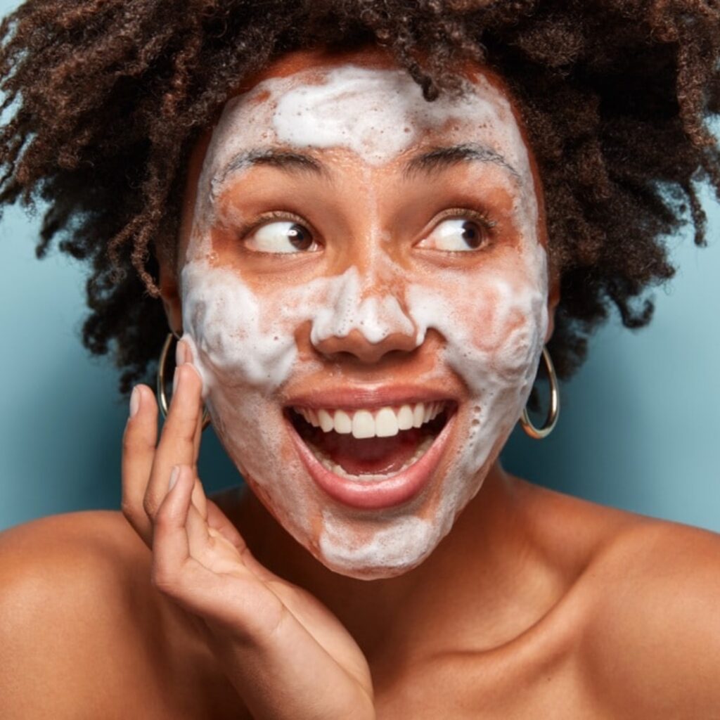 Girl with foam cleanser